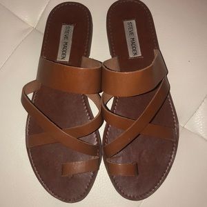 Steve Madden strappy flat sandals.